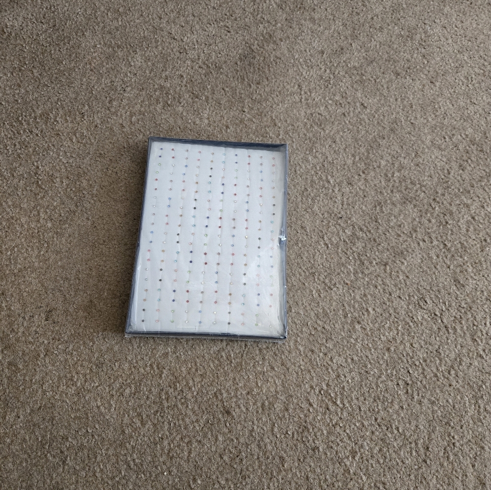 New Without Tags 100 Piece Stud Earings